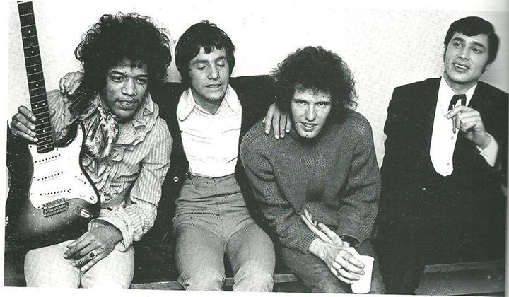 Jimi Hendrix, Cat Stevens, Gary Leeds (Walker) & Engelbert Humperdinck - Backstage at the opening night of the Walker Brothers UK Tour at Finsbury Park Astoria on 31 March 1967. Cat Stevens (holding gun). (1967)